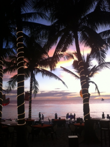 Sonnenuntergang-Palmen